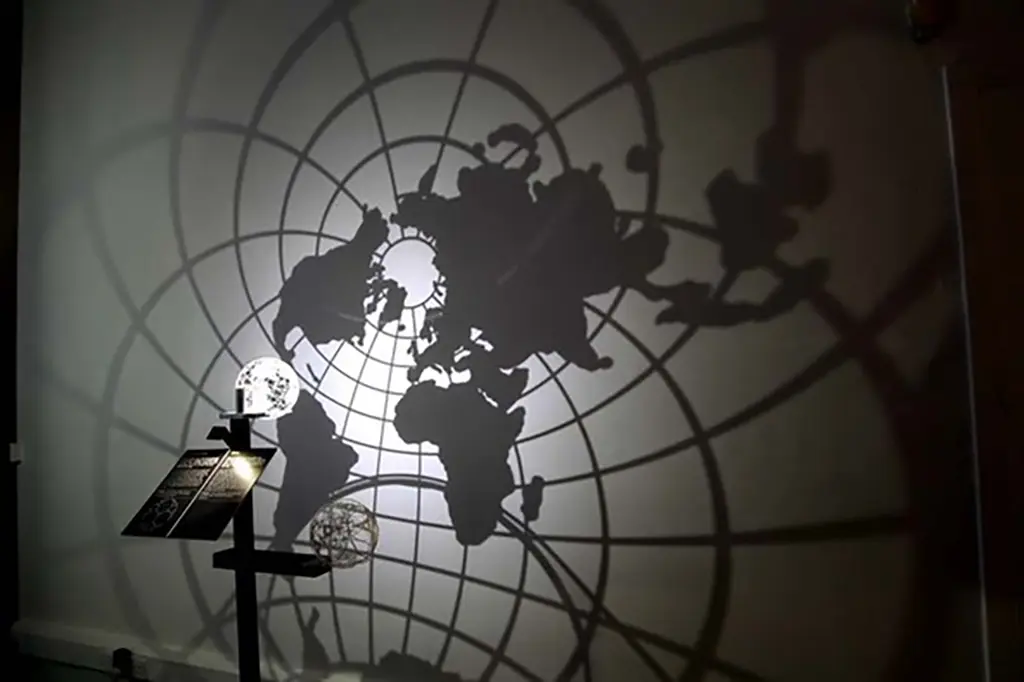 projection of a spherical world map on to a wall