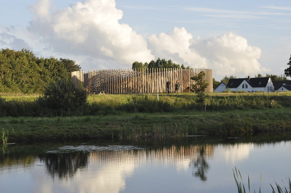 Wooden sound installation by water.