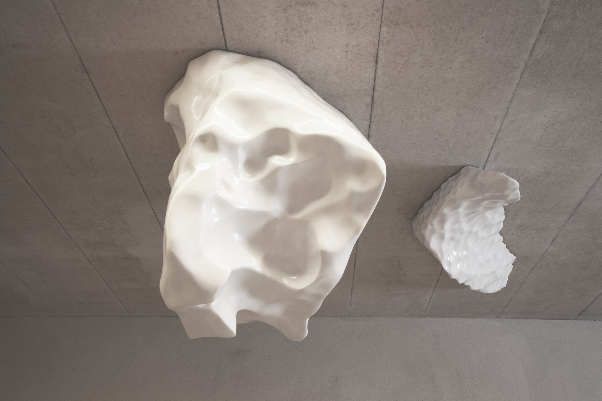 Carrara marble sculpture shaped like an ice fragment.