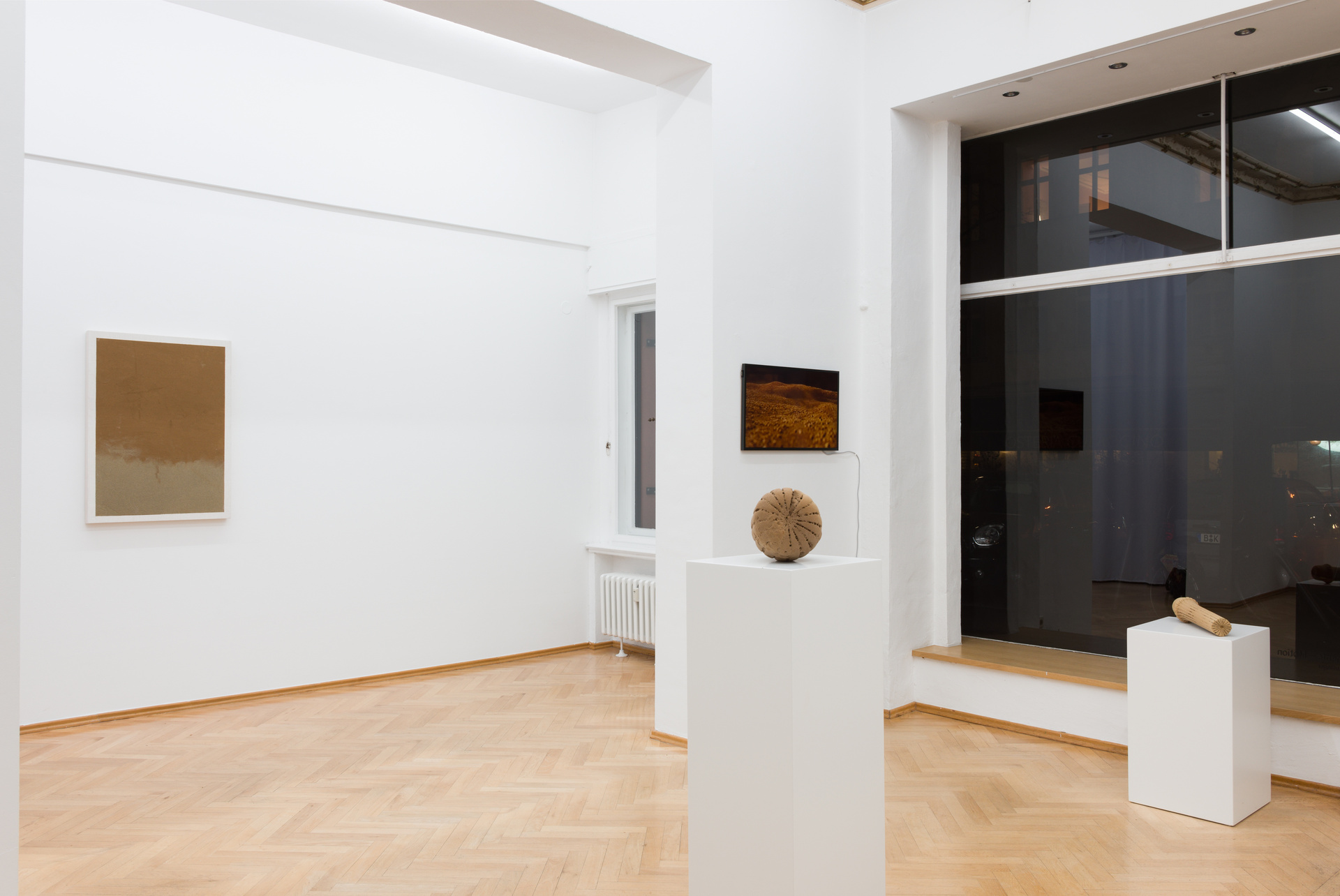 Display of three-dimensional art forms in a gallery setting.