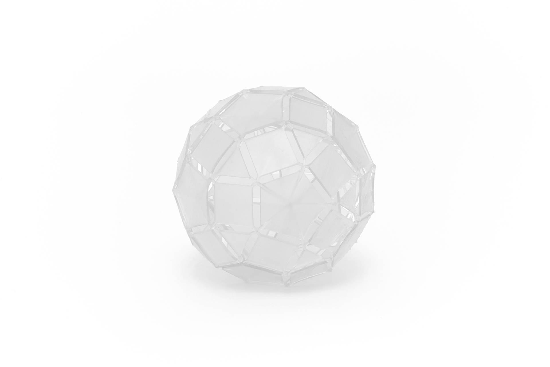 The image displays a transparent resin sphere.