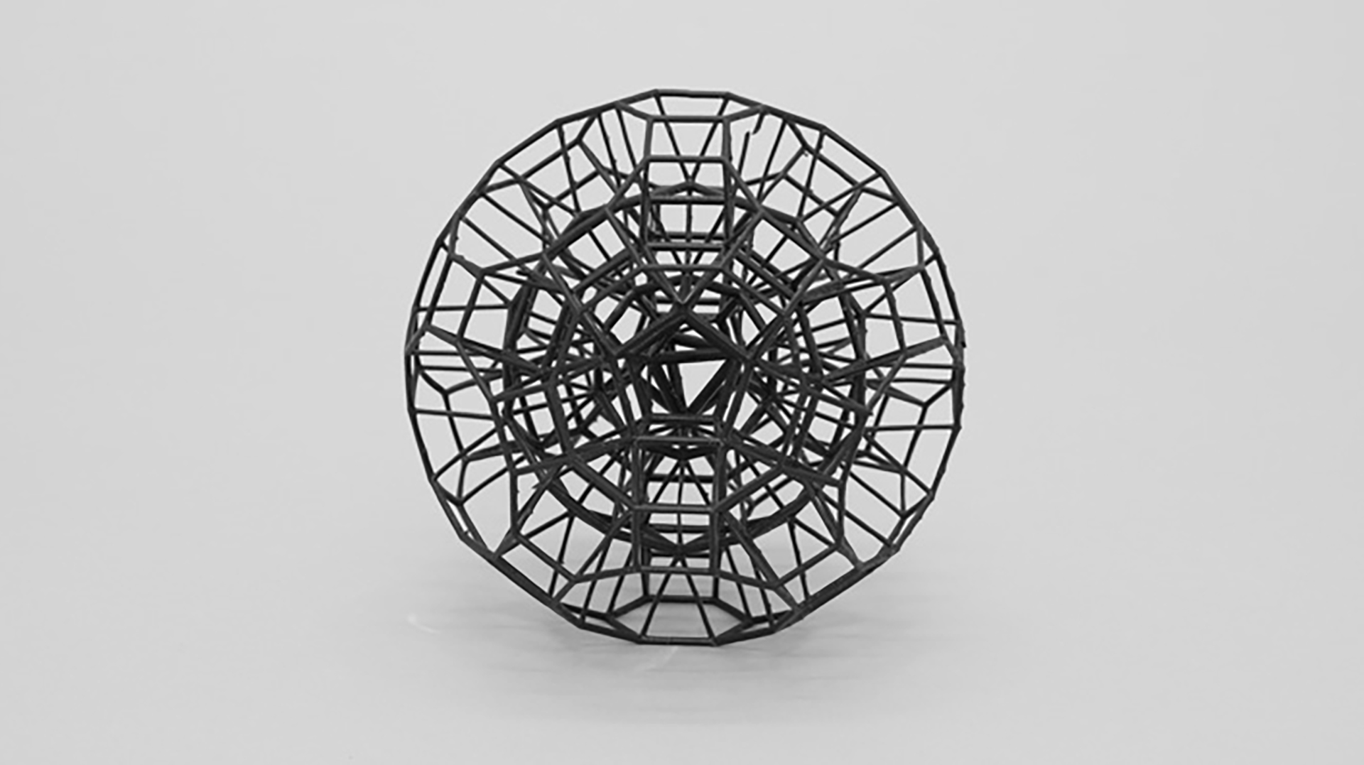 A three-dimensional printed sculpture exhibiting a recursive polyhedral design.