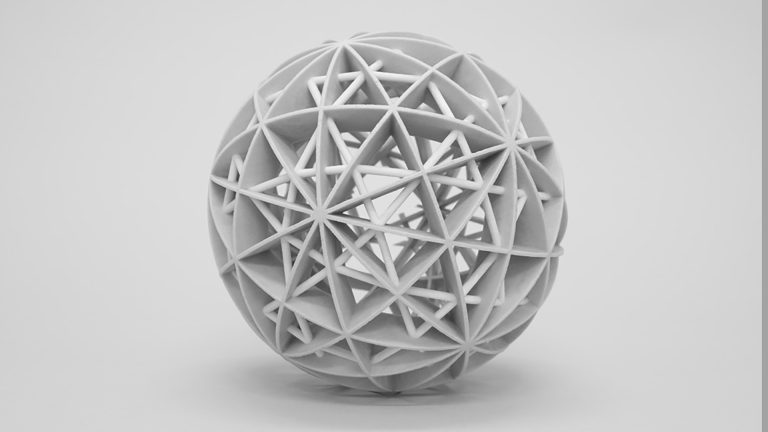Spherical Compounds, 3D printed resin, sits on a white surface.
