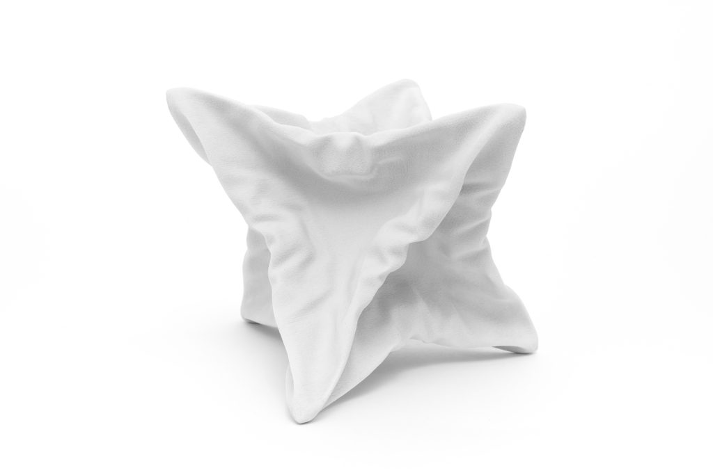 White 3D printed resin polyhedron sits on white background.