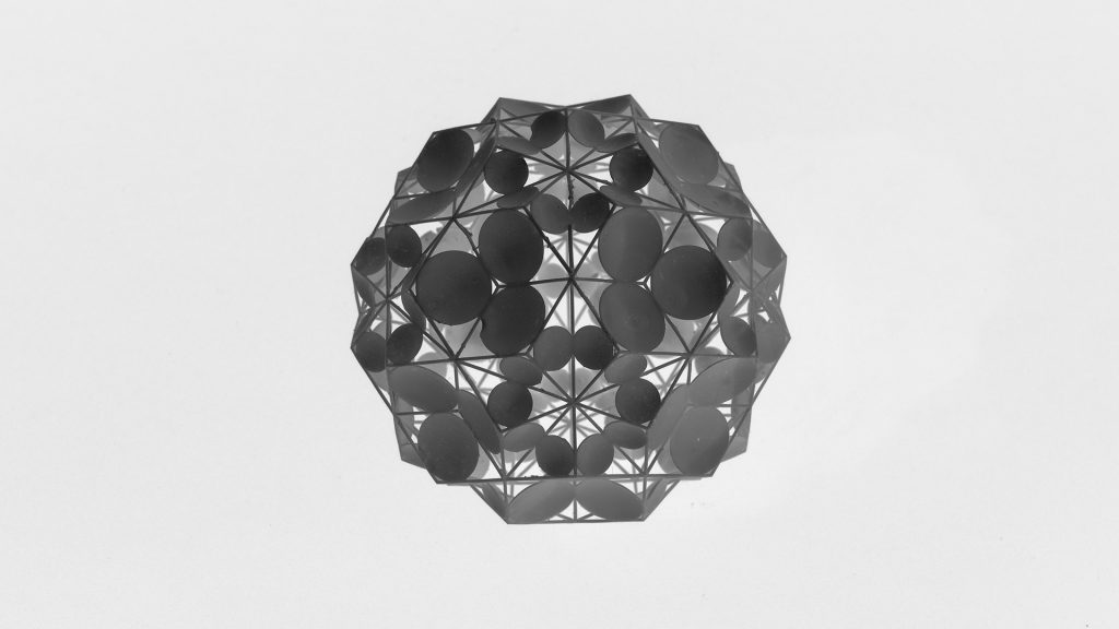 Parabol Stars is a 3D-printed resin model of a polyhedron with parabolic mirrors.