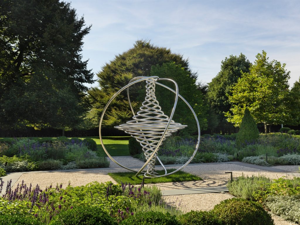 The Planet Spins Despite Me Stopping is a stainless steel three-dimensional spiral sculpture.