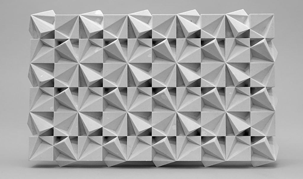SuperCube Walls is a modular wall made of 3D printed resin, showcasing periodic arrangements.