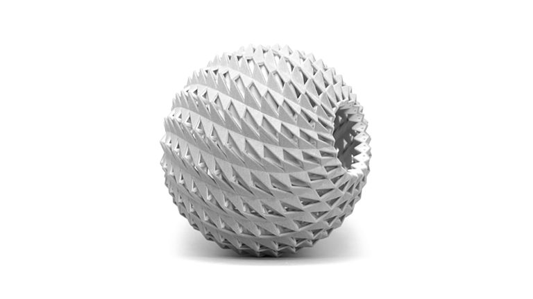 The Atm Sphere is a 3D-printed resin optical study with a spherical shell of triangular panels that reflects light twice from its center.