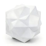 A white 3d printed resin geometric compound sits on a white surface.