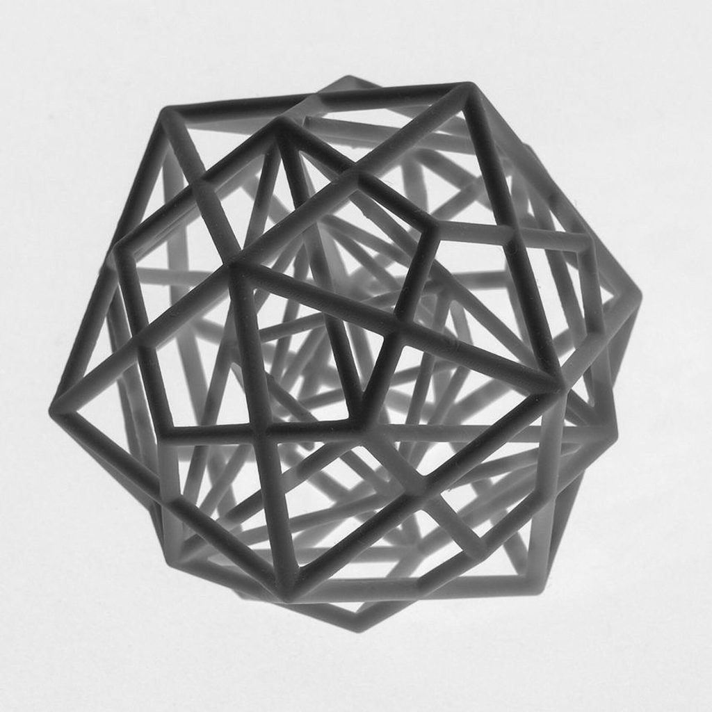 A 3D printed resin object shows interlaced regular polyhedra sharing a common center.